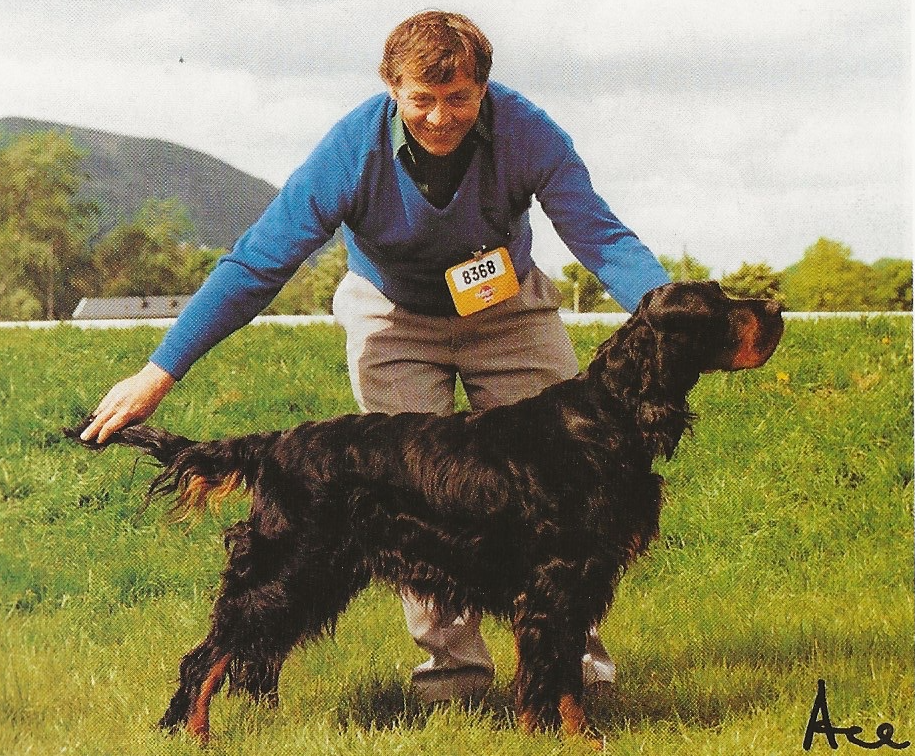 man posing black and tan dog